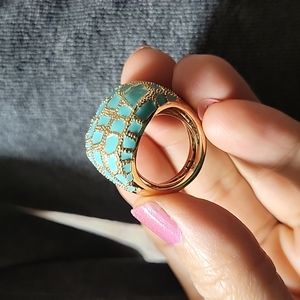 Gold  tone metal turquoise  dome ring.